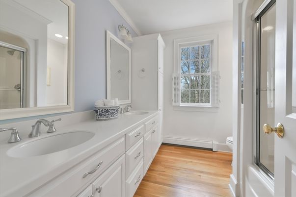 Bathroom, Dual Sink Vanities, Interior, Recessed Lighting, Wood Texture Flooring