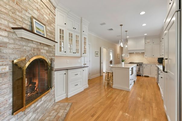 Fireplace, Interior, Kitchen, Pendant Lights, Recessed Lighting, Stone Walls, Wood Texture Flooring