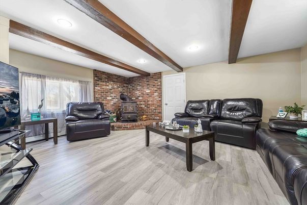 Fireplace, Interior, Living room, Recessed Lighting, Stone Walls, Wooden Beams, Wood Texture Flooring