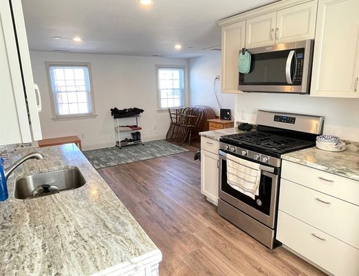 Dining room, Interior, Kitchen, Recessed Lighting, Stainless Steel Appliances, Wood Texture Flooring