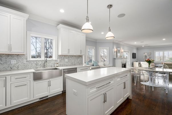 Dining room, Fireplace, Interior, Kitchen, Pendant Lights, Recessed Lighting, Stainless Steel Appliances, Wood Texture Flooring