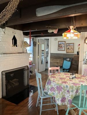 Dining room, Fireplace, Interior, Pendant Lights, Stone Walls, Wooden Beams, Wood Texture Flooring
