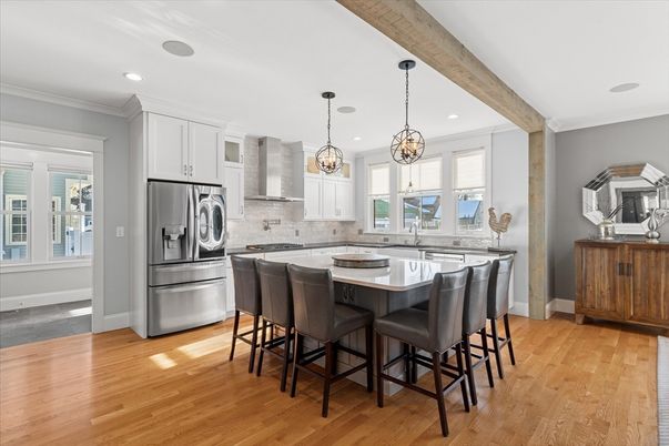 Chandelier, Interior, Kitchen, Pendant Lights, Recessed Lighting, Stainless Steel Appliances, Wooden Beams, Wood Texture Flooring
