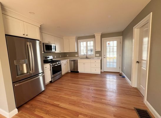 Interior, Kitchen, Recessed Lighting, Stainless Steel Appliances, Wood Texture Flooring