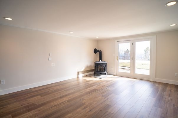 Empty room, Fireplace, Interior, Recessed Lighting, Wood Texture Flooring