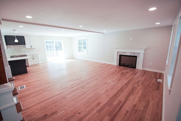Empty room, Fireplace, Interior, Kitchen, Pendant Lights, Recessed Lighting, Wood Texture Flooring