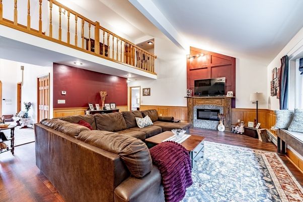 Dining room, Fireplace, Interior, Living room, Recessed Lighting, Wood Texture Flooring