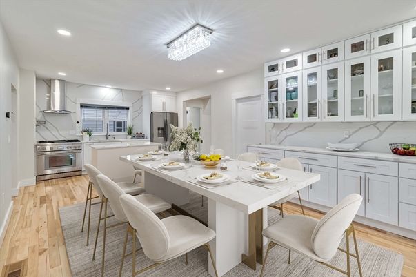 Interior, Kitchen, Marble Walls, Recessed Lighting, Stainless Steel Appliances, Wood Texture Flooring