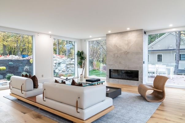 Fireplace, Interior, Living room, Marble Walls, Recessed Lighting, Wood Texture Flooring
