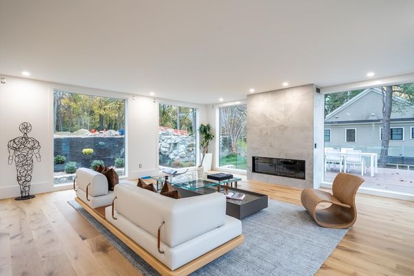 Fireplace, Interior, Living room, Marble Walls, Recessed Lighting, Wood Texture Flooring