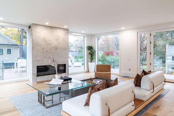Fireplace, Interior, Living room, Marble Walls, Recessed Lighting, Wood Texture Flooring
