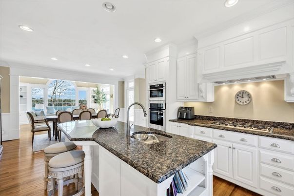 Dining room, Interior, Kitchen, Recessed Lighting, Stainless Steel Appliances, Wood Texture Flooring