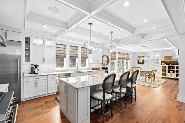 Chandelier, Dining room, Interior, Kitchen, Pendant Lights, Recessed Lighting, Stainless Steel Appliances, Wood Texture Flooring