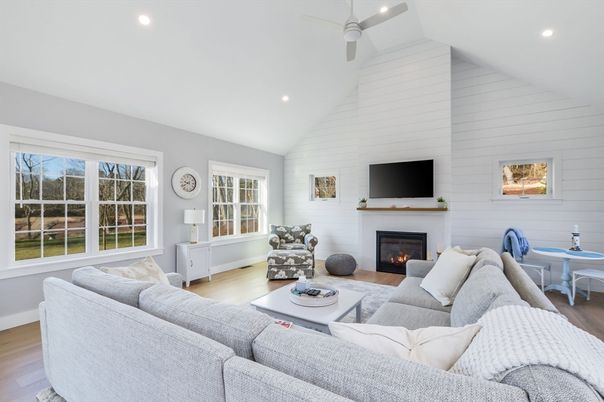 Fireplace, Interior, Living room, Recessed Lighting, Stone Walls, Wood Texture Flooring