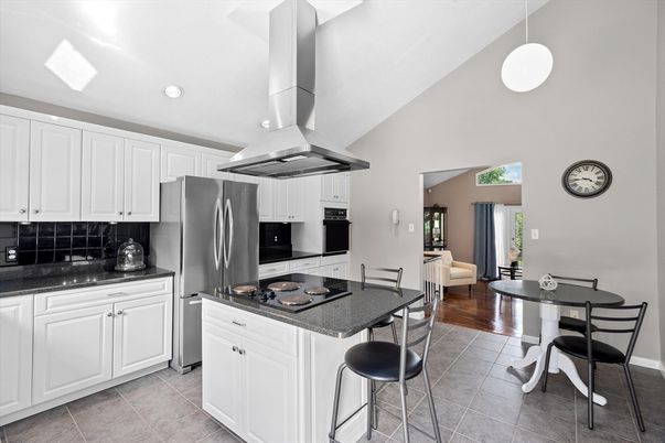 Dining room, Interior, Kitchen, Living room, Pendant Lights, Recessed Lighting, Stainless Steel Appliances, Wood Texture Flooring