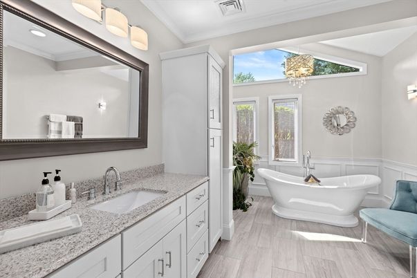 Bathroom, Chandelier, Dual Sink Vanities, Free Standing Baths, Interior, Pendant Lights, Wood Texture Flooring