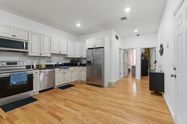 Interior, Kitchen, Recessed Lighting, Stainless Steel Appliances, Wood Texture Flooring
