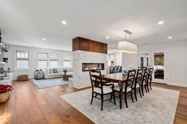 Dining room, Fireplace, Interior, Living room, Pendant Lights, Recessed Lighting, Wood Texture Flooring