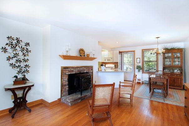 Chandelier, Dining room, Fireplace, Interior, Kitchen, Recessed Lighting, Wood Texture Flooring