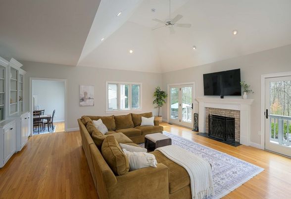 Dining room, Fireplace, Interior, Living room, Recessed Lighting, Wood Texture Flooring