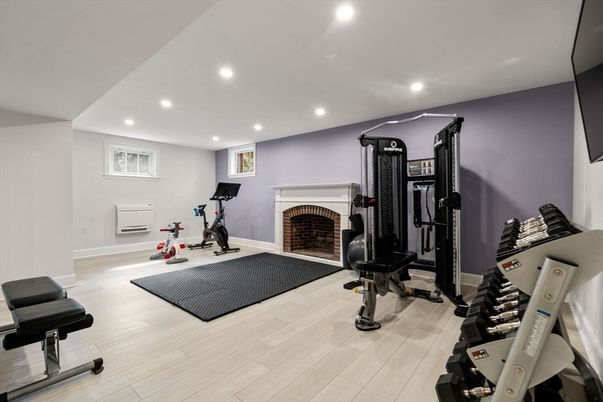 Fireplace, Fitness Equipment, Interior, Recessed Lighting, Wood Texture Flooring