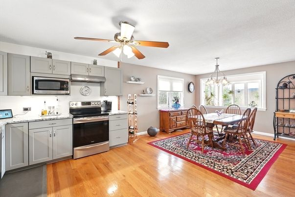 Chandelier, Dining room, Interior, Kitchen, Stainless Steel Appliances, Wood Texture Flooring