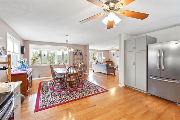 Chandelier, Dining room, Interior, Kitchen, Living room, Pendant Lights, Stainless Steel Appliances, Wood Texture Flooring