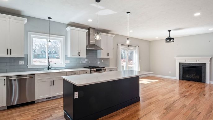 Fireplace, Interior, Kitchen, Pendant Lights, Recessed Lighting, Stainless Steel Appliances, Wood Texture Flooring