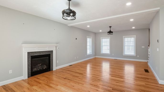Empty room, Fireplace, Interior, Pendant Lights, Recessed Lighting, Wood Texture Flooring
