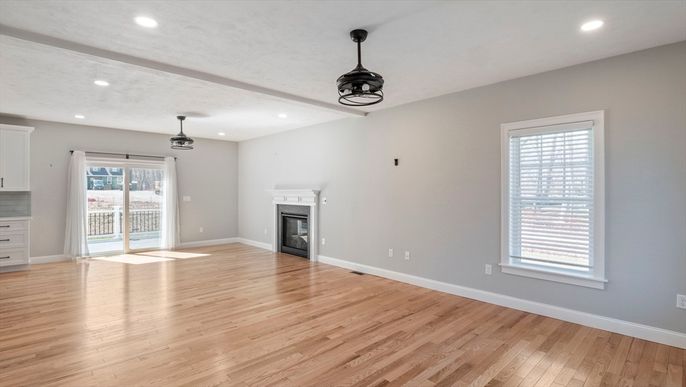 Empty room, Fireplace, Interior, Pendant Lights, Recessed Lighting, Wood Texture Flooring