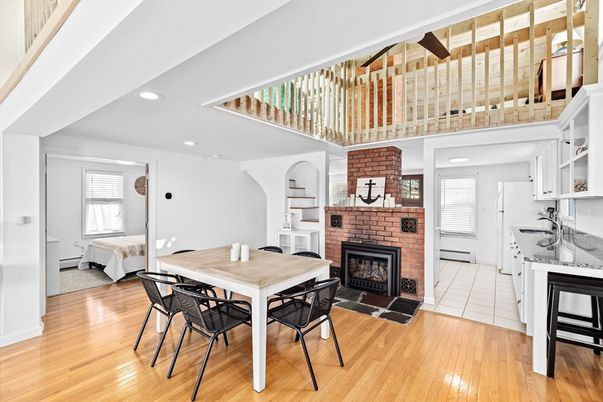 Dining room, Fireplace, Interior, Recessed Lighting, Wood Texture Flooring