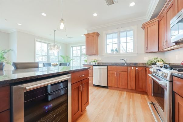 Dining room, Interior, Kitchen, Pendant Lights, Recessed Lighting, Stainless Steel Appliances, Wood Texture Flooring