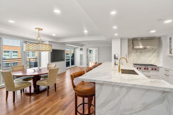 Dining room, Interior, Kitchen, Marble Walls, Pendant Lights, Recessed Lighting, Stainless Steel Appliances, Wood Texture Flooring