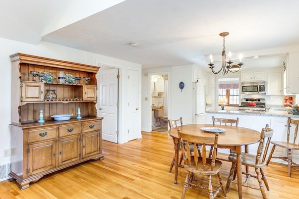 Chandelier, Dining room, Interior, Kitchen, Stainless Steel Appliances, Wood Texture Flooring