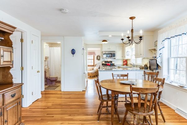 Chandelier, Dining room, Interior, Kitchen, Recessed Lighting, Stainless Steel Appliances, Wood Texture Flooring