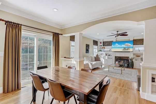 Dining room, Fireplace, Interior, Living room, Recessed Lighting, Wood Texture Flooring