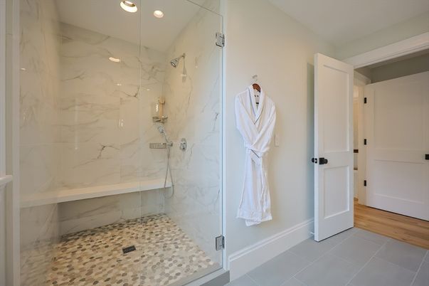 Bathroom, Glass Shower, Interior, Marble Walls, Recessed Lighting, Wood Texture Flooring