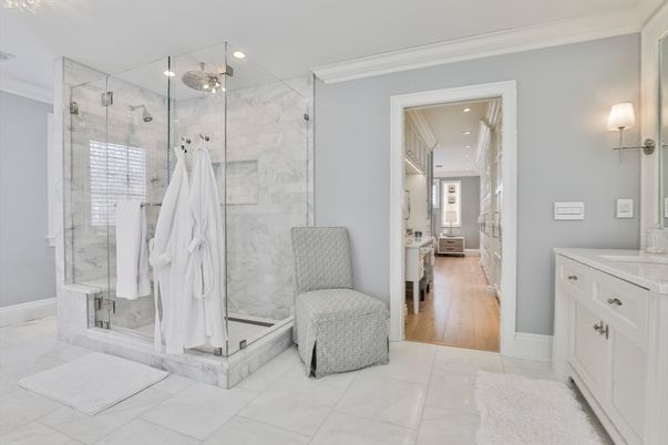 Bathroom, Glass Shower, Interior, Marble Walls, Recessed Lighting, Wood Texture Flooring