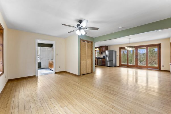 Empty room, Interior, Kitchen, Pendant Lights, Stainless Steel Appliances, Wood Texture Flooring