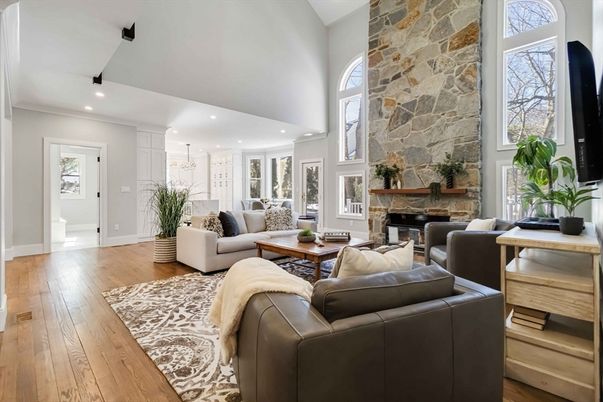 Fireplace, Interior, Living room, Recessed Lighting, Stone Walls, Wood Texture Flooring