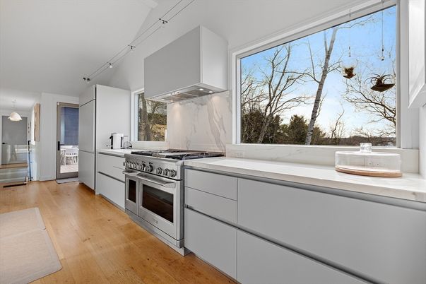 Interior, Kitchen, Marble Walls, Stainless Steel Appliances, Wood Texture Flooring