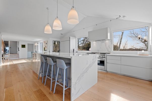 Interior, Kitchen, Marble Walls, Pendant Lights, Stainless Steel Appliances, Wood Texture Flooring