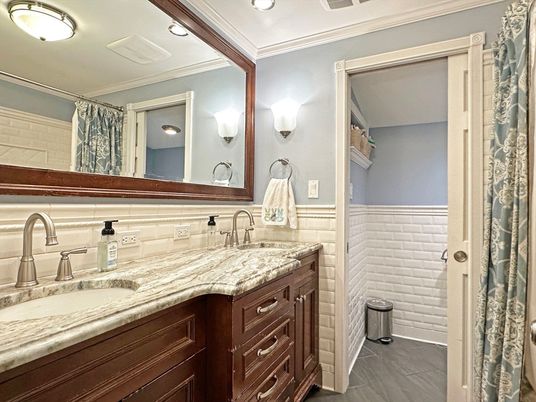 Bathroom, Dual Sink Vanities, Interior, Recessed Lighting, Wood Texture Flooring