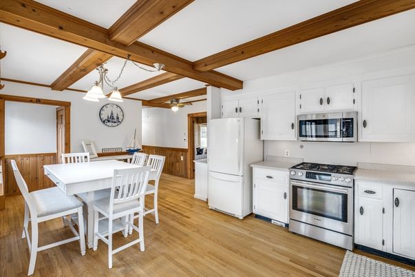 Dining room, Interior, Kitchen, Pendant Lights, Stainless Steel Appliances, Wooden Beams, Wood Texture Flooring