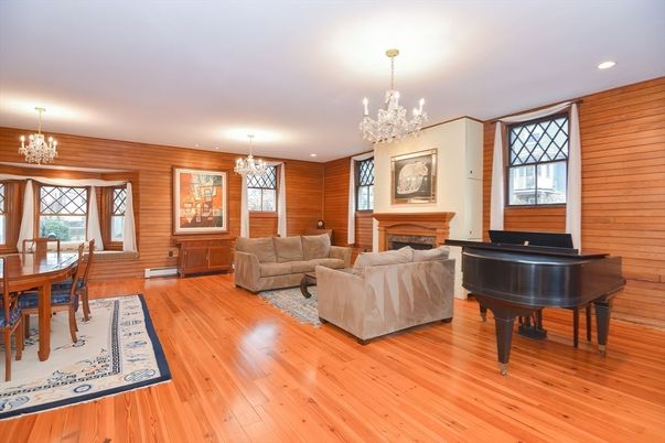 Chandelier, Dining room, Fireplace, Interior, Living room, Piano, Recessed Lighting, Wood Texture Flooring, Wooden Walls