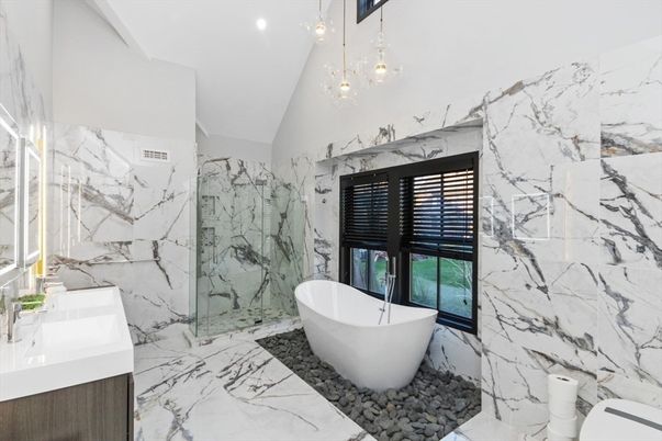Bathroom, Free Standing Baths, Glass Shower, Interior, Marble, Marble Walls, Pendant Lights, Recessed Lighting