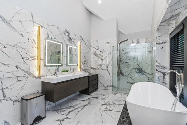 Bathroom, Dual Sink Vanities, Free Standing Baths, Glass Shower, Interior, Marble, Marble Walls, Recessed Lighting