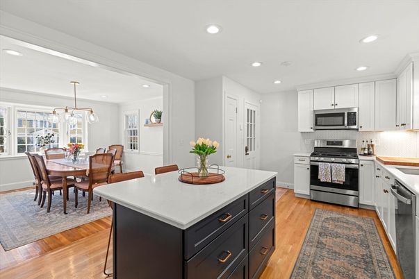 Dining room, Interior, Kitchen, Pendant Lights, Recessed Lighting, Stainless Steel Appliances, Wood Texture Flooring