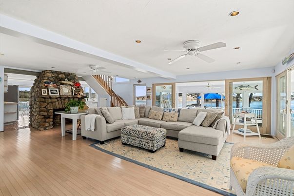 Fireplace, Interior, Living room, Recessed Lighting, Stone Walls, Wood Texture Flooring