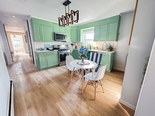 Dining room, Interior, Kitchen, Pendant Lights, Recessed Lighting, Stainless Steel Appliances, Wood Texture Flooring